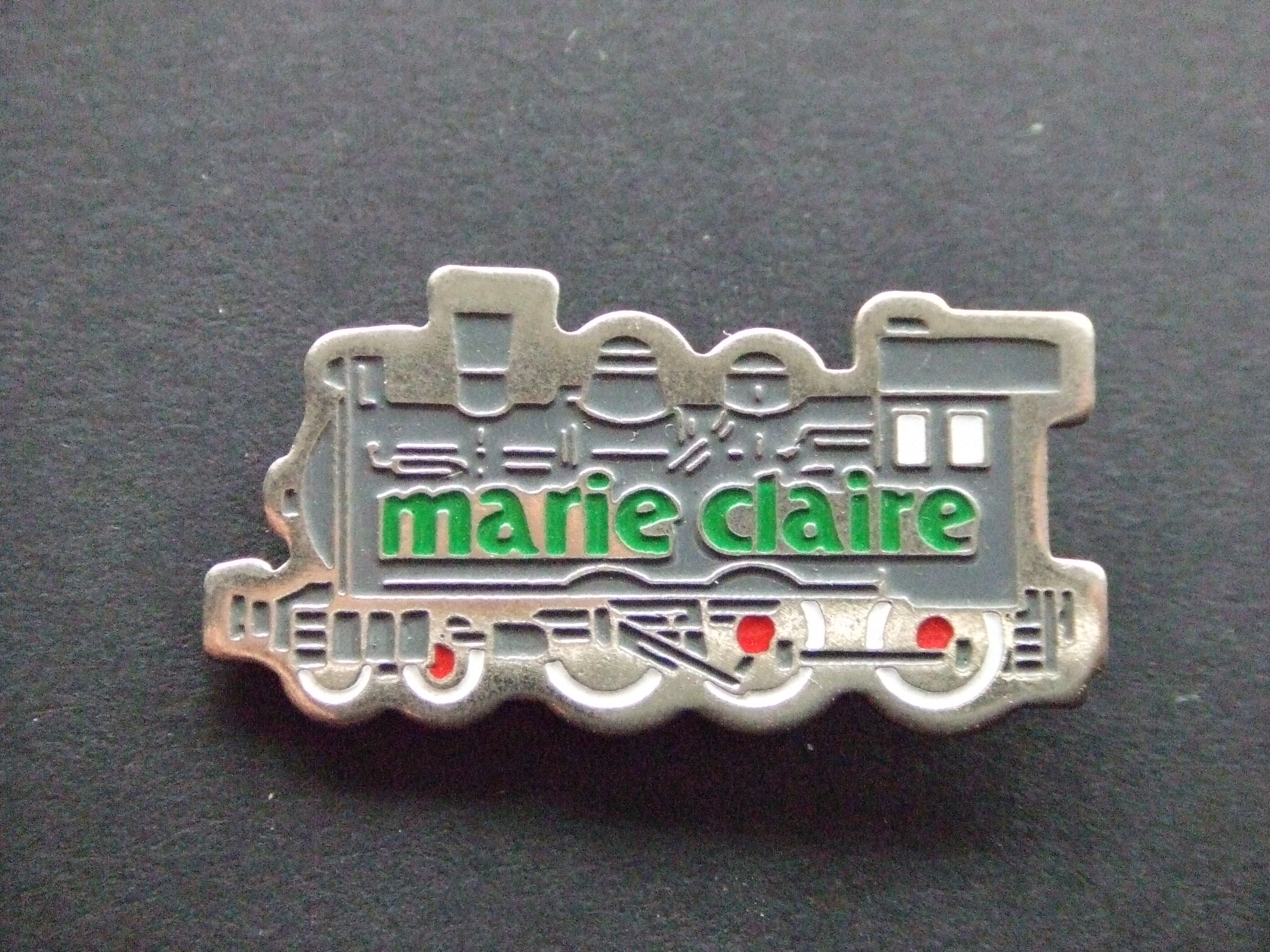 Marie Claire bron, mineraalwater, trein